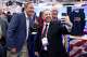 Greg Smith (center) takes a photo with Texas Attorney (left) General Ken Paxton during Conservative Political Action Conference, on Friday, March 27, 2026 at Gaylord Texan Resort and Conference Center in Grapevine.