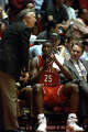 Illinois coach Lou Henson talks to Deon Thomas (25) on the bench during the game vs. Vanderbilt at Jon M. Huntsman Center in Salt Lake City, Utah, on March 20, 1993.