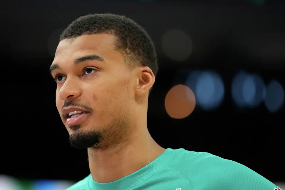 San Antonio Spurs' Victor Wembanyama gives a post-game interview after an NBA basketball game against the Milwaukee Bucks, Saturday, March 28, 2026, in Milwaukee. (AP Photo/Aaron Gash)