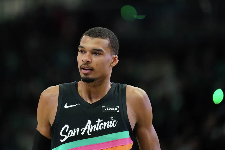San Antonio Spurs' Victor Wembanyama looks on during the first half of an NBA basketball game against the Milwaukee Bucks, Saturday, March 28, 2026, in Milwaukee. (AP Photo/Aaron Gash)