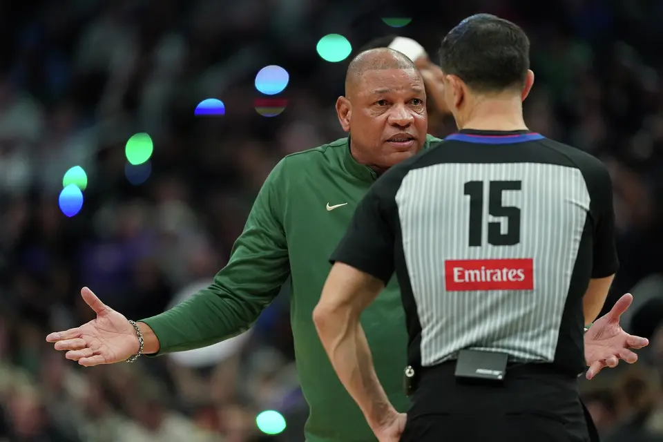Milwaukee Bucks head coach Doc Rivers reacts as he talks with an official during the first half of an NBA basketball game against the San Antonio Spurs, Saturday, March 28, 2026, in Milwaukee. (AP Photo/Aaron Gash)
