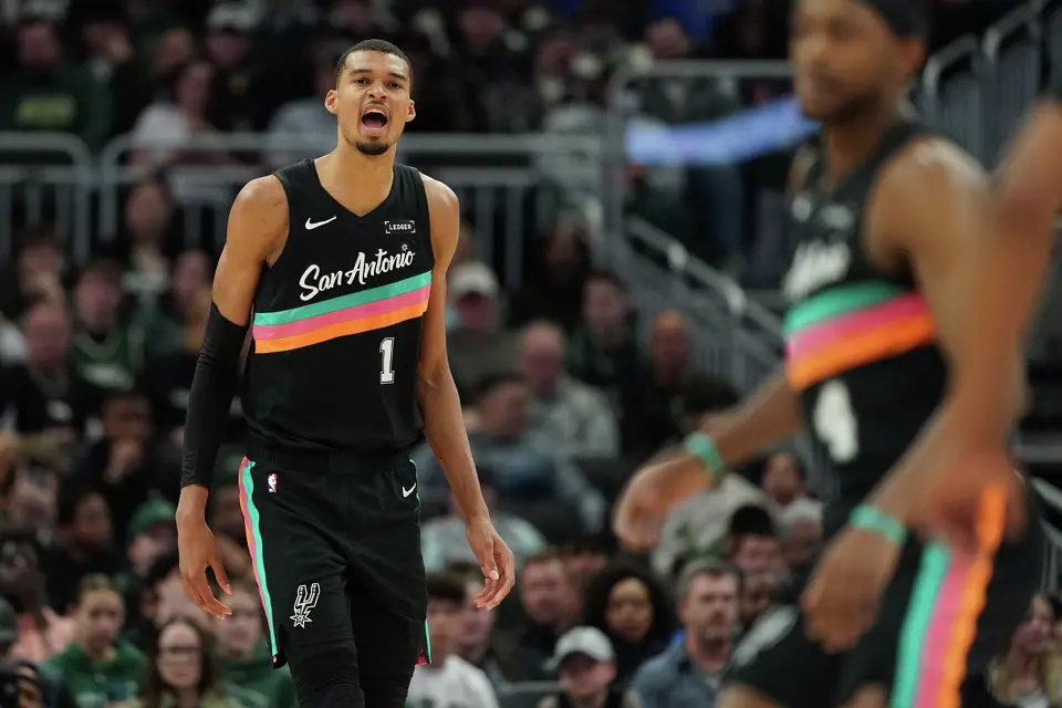 San Antonio Spurs' Victor Wembanyama yells during the second half of an NBA basketball game against the Milwaukee Bucks, Saturday, March 28, 2026, in Milwaukee. (AP Photo/Aaron Gash)