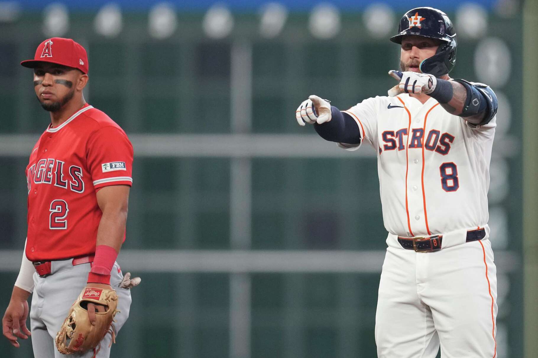 Houston Astros Christian Walker (8) reacts after hitting a double during the third inning of a MLB baseball game at Daikin Park, Saturday, March 28, 2026, in Houston.