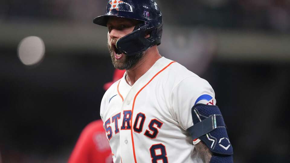 Houston Astros Christian Walker (8) reacts after hitting a RBI single during the sixth inning of a MLB baseball game at Daikin Park, Saturday, March 28, 2026, in Houston.