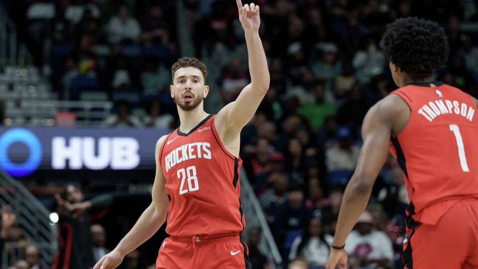 Houston Rockets center Alperen Sengun (28) reacts after a 3-point basket against the New Orleans Pelicans during the first half of an NBA basketball game in New Orleans, Sunday, March 29, 2026. (AP Photo/Matthew Hinton)