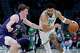 Boston Celtics forward Jayson Tatum, right, drives against Charlotte Hornets guard Kon Knueppel during the second half of an NBA basketball game in Charlotte, N.C., Sunday, March 29, 2026.