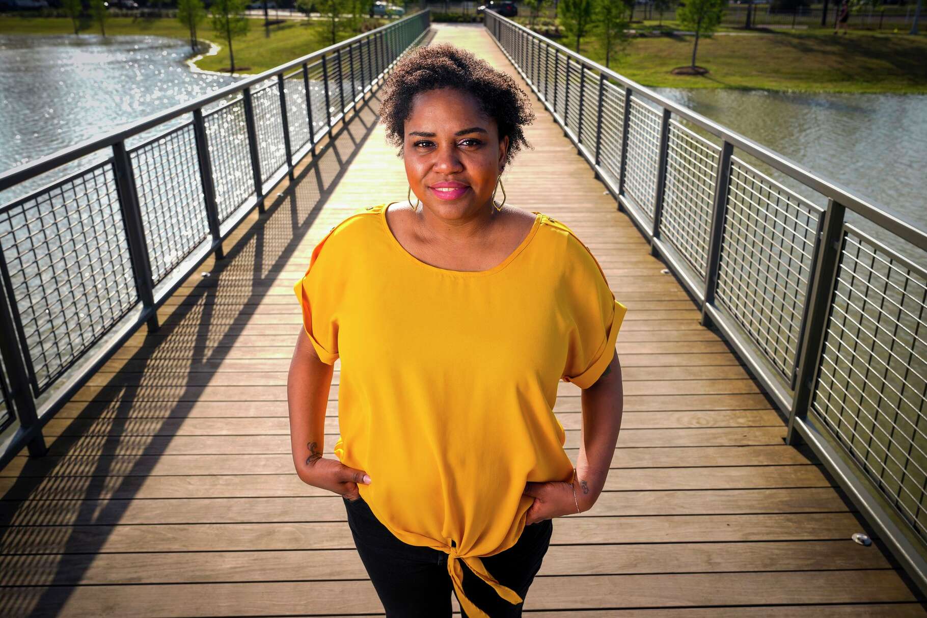 Jasmine Ellis poses for a portrait in Spring, Monday, March 30, 2026. Ellis, a University of Texas graduate who has worked in media ad services since 2014, talks about her journey after she was laid off last June.