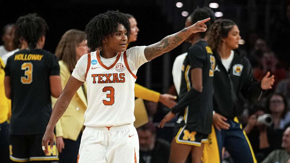Texas Longhorns guard Rori Harmon (3) points to the crowd after a score during the NCAA Women’s Basketball Tournament Elite 8 game against Michigan at Dickies Arena on Monday, March 30, 2026 in Fort Worth, Texas.