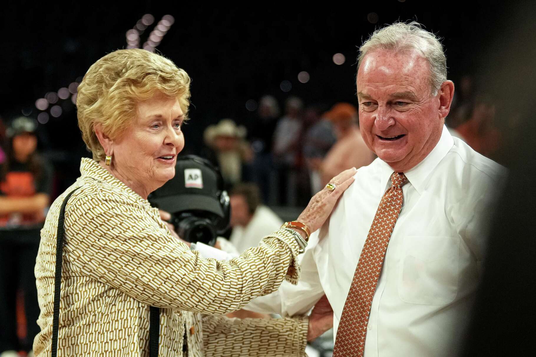Former Texas Longhorns head coach Jody Conradt congratulates coach Vic Schaefer after winning the NCAA Women's Basketball Tournament Elite 8 game against Michigan at Dickies Arena on Monday, March 30, 2026 in Fort Worth, Texas.