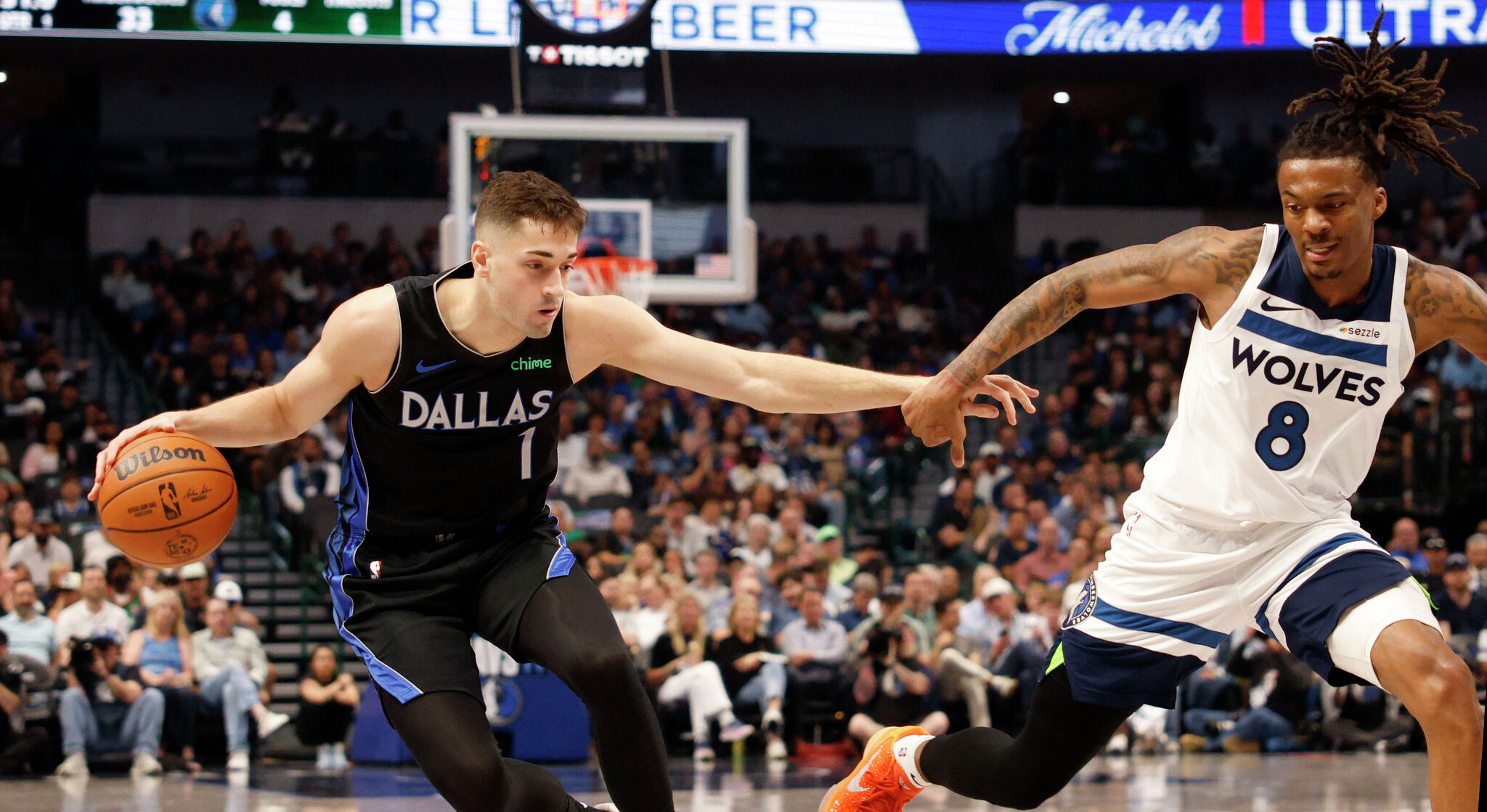 Mavericks rookie John Poulakidas earns respect from Devin Booker