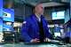 Philip Finale works on the floor at the New York Stock Exchange in New York, Tuesday, March 31, 2026.