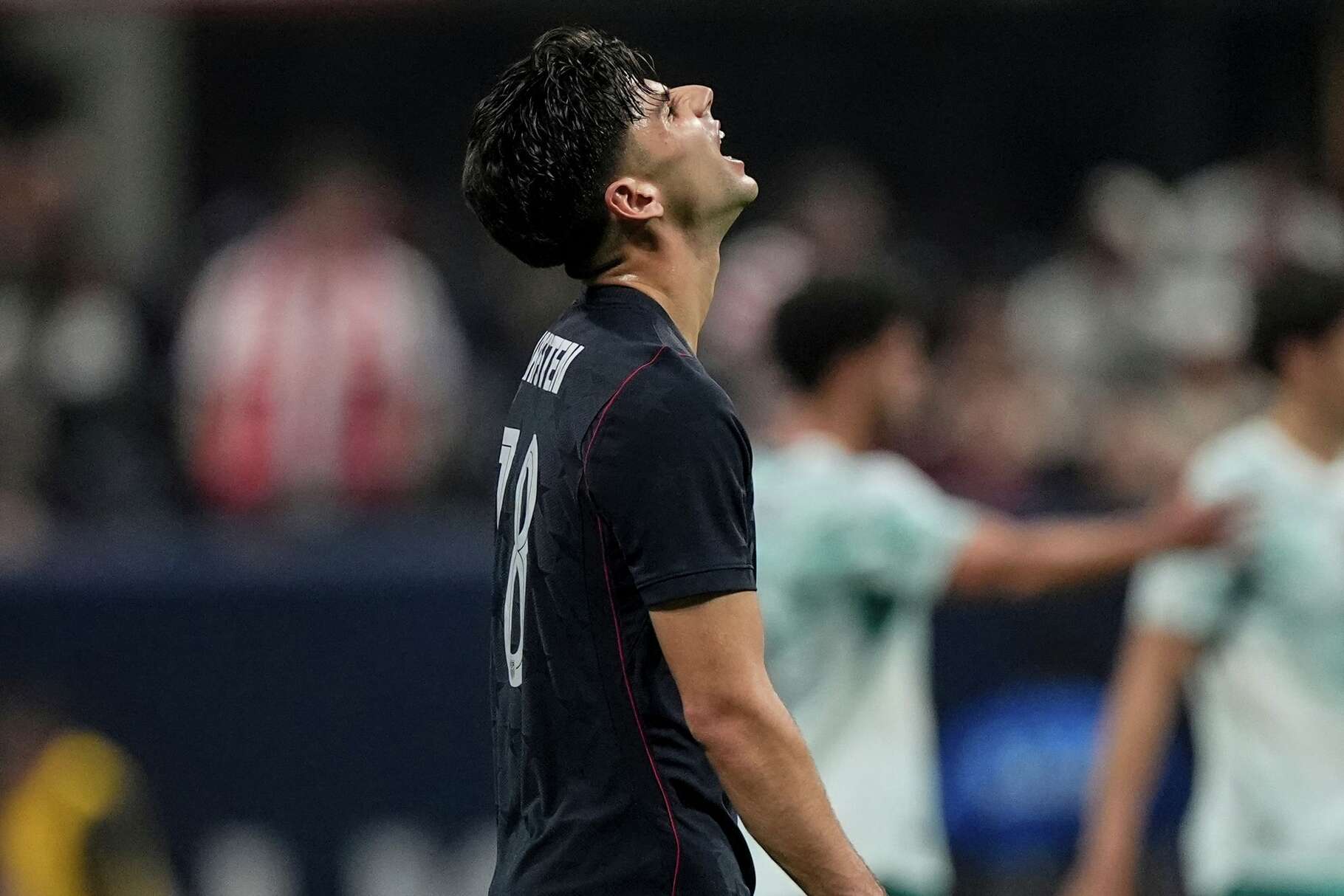 USA's Max Arfsten (18) reacts to losing against Portugal during the second half of an international friendly soccer match, Tuesday, March 31, 2026, in Atlanta. (AP Photo/Mike Stewart)
