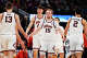 Jake Davis #15 of the Illinois Fighting Illini greets Tomislav Ivisic and Andrej Stojakovic during the Elite Eight round game of the 2026 NCAA Men's Basketball Tournament held at Toyota Center on March 28, 2026, in Houston, Texas.