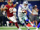 Dallas Cowboys quarterback Dak Prescott (4) races to the goal line for a fourth quarter touchdown against the Washington Redskins defense at AT&T Stadium in Arlington, Texas, Thursday, November 22, 2018. Dak kept the ball after not being able to find a receiver. The Cowboys defeated the Redskins, 31-23. (Tom Fox/The Dallas Morning News)