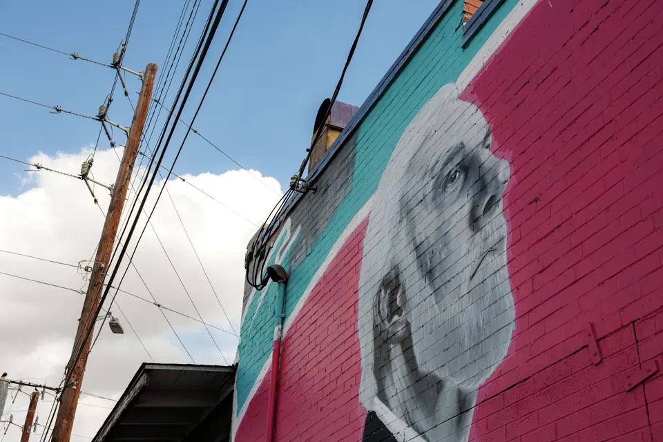 A mural featuring former San Antonio Spurs head coach Gregg Popovich can be found on the Fire House Church building at the corner of East Mitchell Street and Roosevelt Avenue.