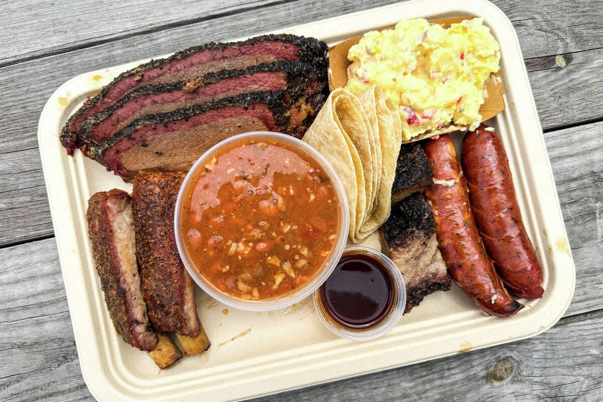 Texas trinity (brisket, pork ribs, sausage) with potato salad at Bird's Barbecue, Belleville
