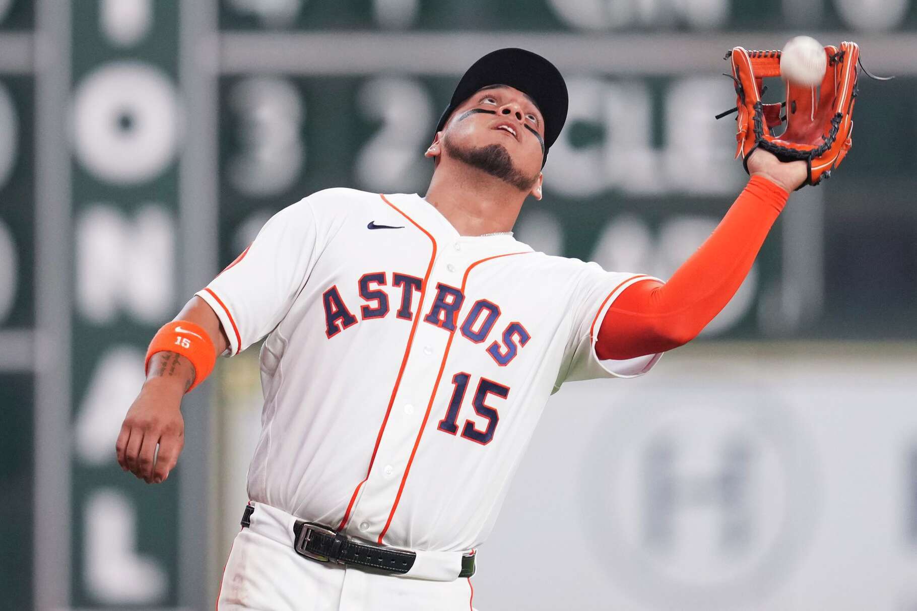 Houston Astros third baseman Isaac Paredes (15) catches a fly ball by Boston Red Sox Wilyer Abreu during the first inning of a MLB baseball game at Daikin Park, Wednesday, April 1, 2026, in Houston.