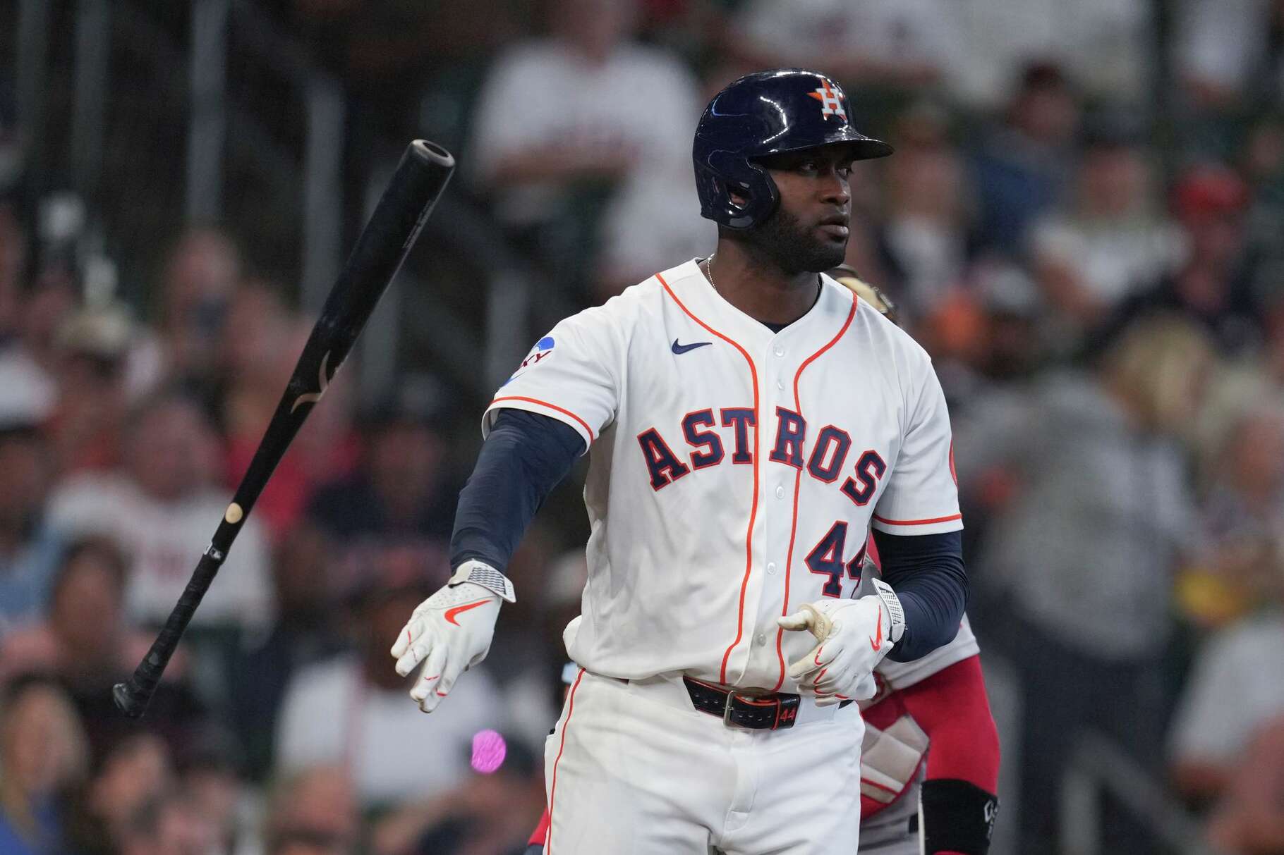 Houston Astros designated hitter Yordan Alvarez (44) throws his bat down after being hit by a pitch form Boston Red Sox pitcher Garrett Crochet during the fifth inning of a MLB baseball game at Daikin Park, Wednesday, April 1, 2026, in Houston.