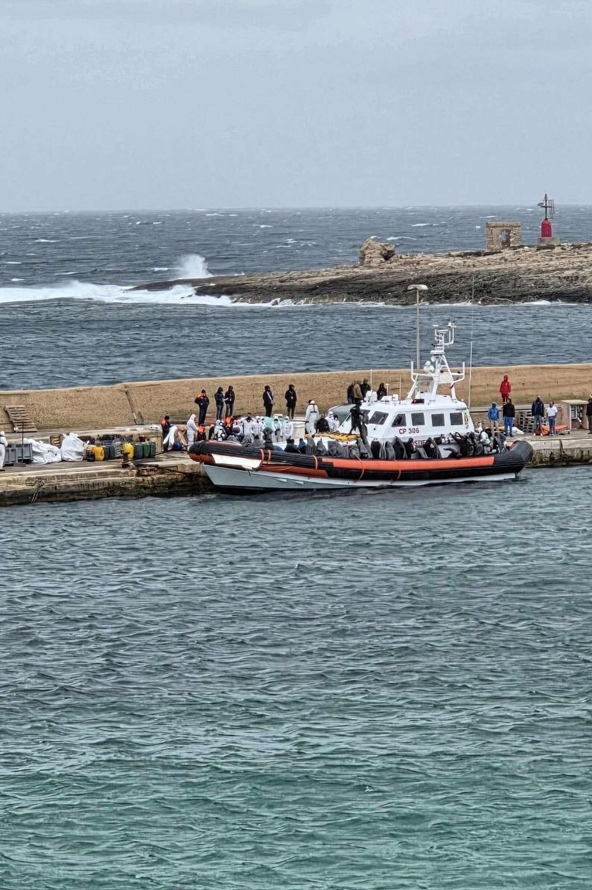Italian coast guard finds 19 migrants dead and rescues 58 from dinghy ...