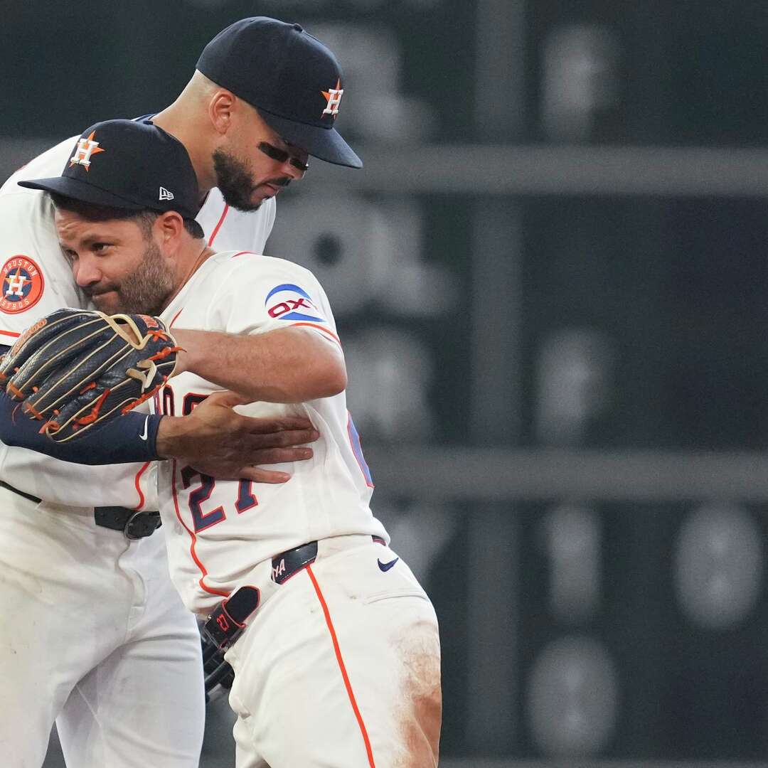 Houston Astros shortstop Carlos Correa (1) celebrates with second baseman Jose Altuve (27) after beating the Boston Red Sox 6-4 during a MLB baseball game at Daikin Park, Wednesday, April 1, 2026, in Houston.