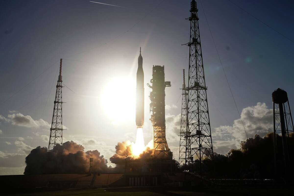 The NASA Artemis II SLS (Space Launch System) rocket with the Orion spacecraft launches at the Kennedy Space Center, Wednesday, April 1, 2026, in Cape Canaveral, Fla. (AP Photo/John Raoux)