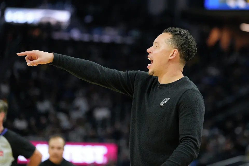 San Antonio Spurs head coach Mitch Johnson gestures to his team during the first half of an NBA basketball game against the Golden State Warriors in San Francisco, Wednesday, April 1, 2026. (AP Photo/Tony Avelar)