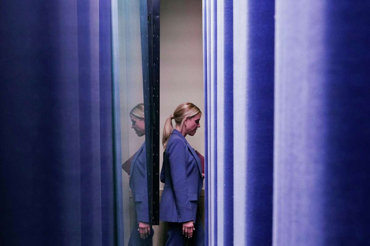 FILE - Attorney General Pam Bondi leaving after the end of President Donald Trump's remarks to reporters in the James Brady Press Briefing Room at the White House, Feb. 20, 2026, in Washington.