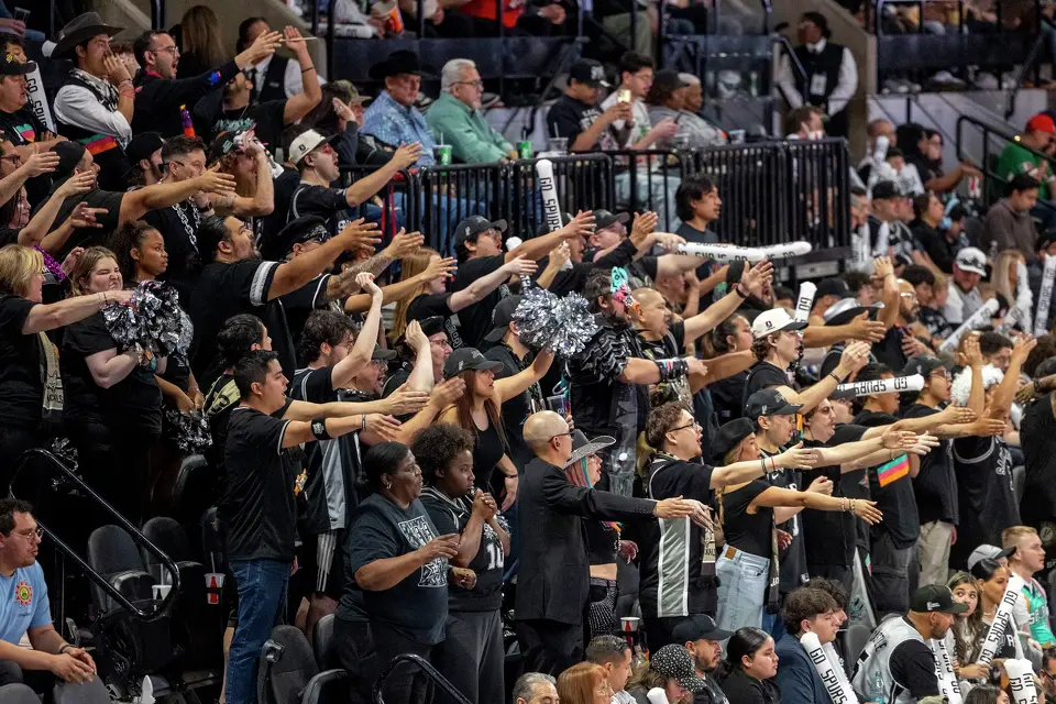 The Spurs Jackals stand for the entire game as they cheer on the team at Frost Bank Center Thursday, March 12, 2026, in San Antonio.