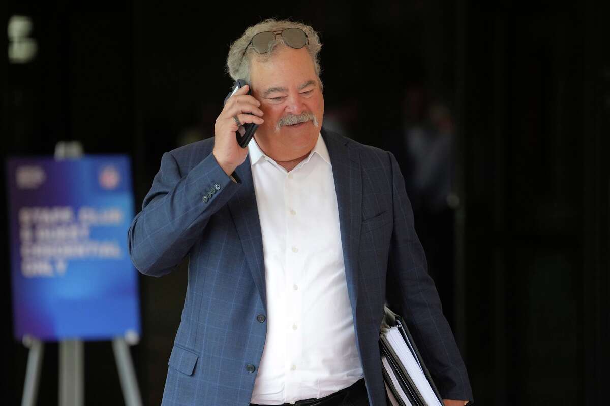 Houston Texans owner Cal McNair walks after attending a session at the NFL football annual meetings, Tuesday, March 31, 2026, in Phoenix. (AP Photo/Ross D. Franklin)
