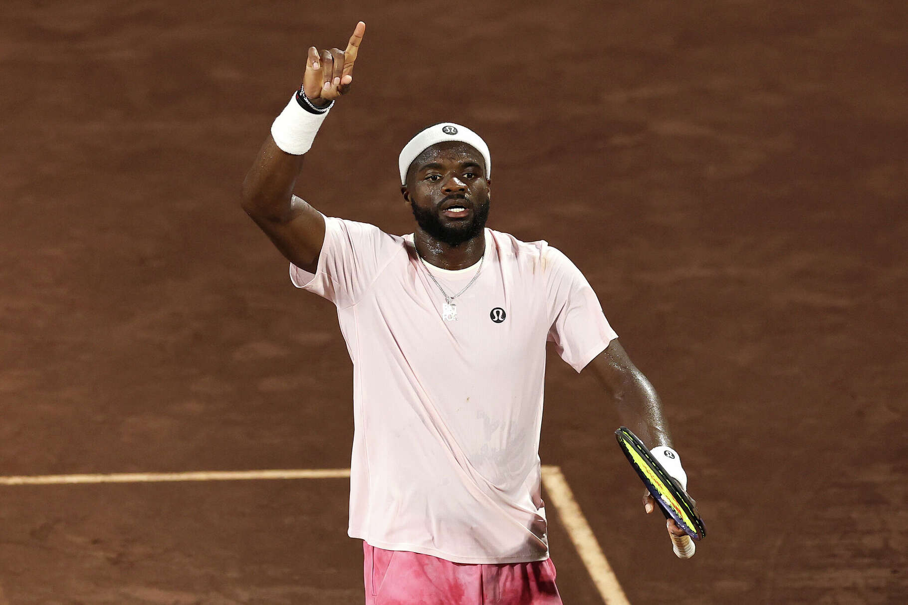 Frances Tiafoe of the United States reacts while playing against Rinky Hijikata of Australia during the Singles match on Day 4 of the Fayez Sarofim & Co. U.S. Men's Clay Court Championship at River Oaks Country Club.