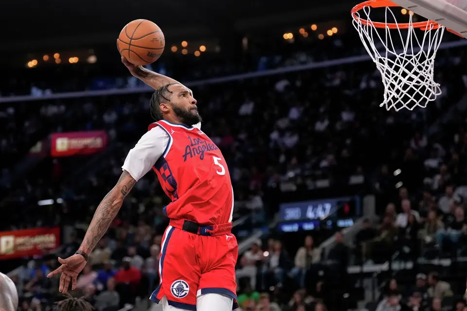 Los Angeles Clippers forward Derrick Jones Jr. dunks during the second half of an NBA basketball game against the San Antonio Spurs, Thursday, April 2, 2026, in Inglewood, Calif. (AP Photo/Mark J. Terrill)