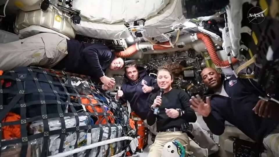 Artemis II crew members, from left, Canadian Space Agency astronaut Jeremy Hansen and NASA astronauts Reid Wiseman, Christina Hammock Koch and Victor Glover answer questions from reporters on Thursday, April 2, 2026, during the first live video of their mission.