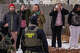 Observers film while federal agents conduct immigration enforcement operations in February in Minneapolis. The Trump administration's immigration policies have fallen out of favor with Americans.