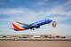 A Southwest flight takes off.