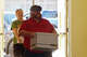Volunteers and others from First Christian Church's Life Groups, Scout Troops 107 and 113 and the Jacksonville High School football team shuttle boxes, instruments and furnishings from MacMurray Hall to the new home of The Esprit de Corps Academy in the former Grace United Methodist Church building.
