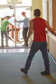 Volunteers and others from First Christian Church's Life Groups, Scout Troops 107 and 113 and the Jacksonville High School football team shuttle boxes, instruments and furnishings from MacMurray Hall to the new home of The Esprit de Corps Academy in the former Grace United Methodist Church building.