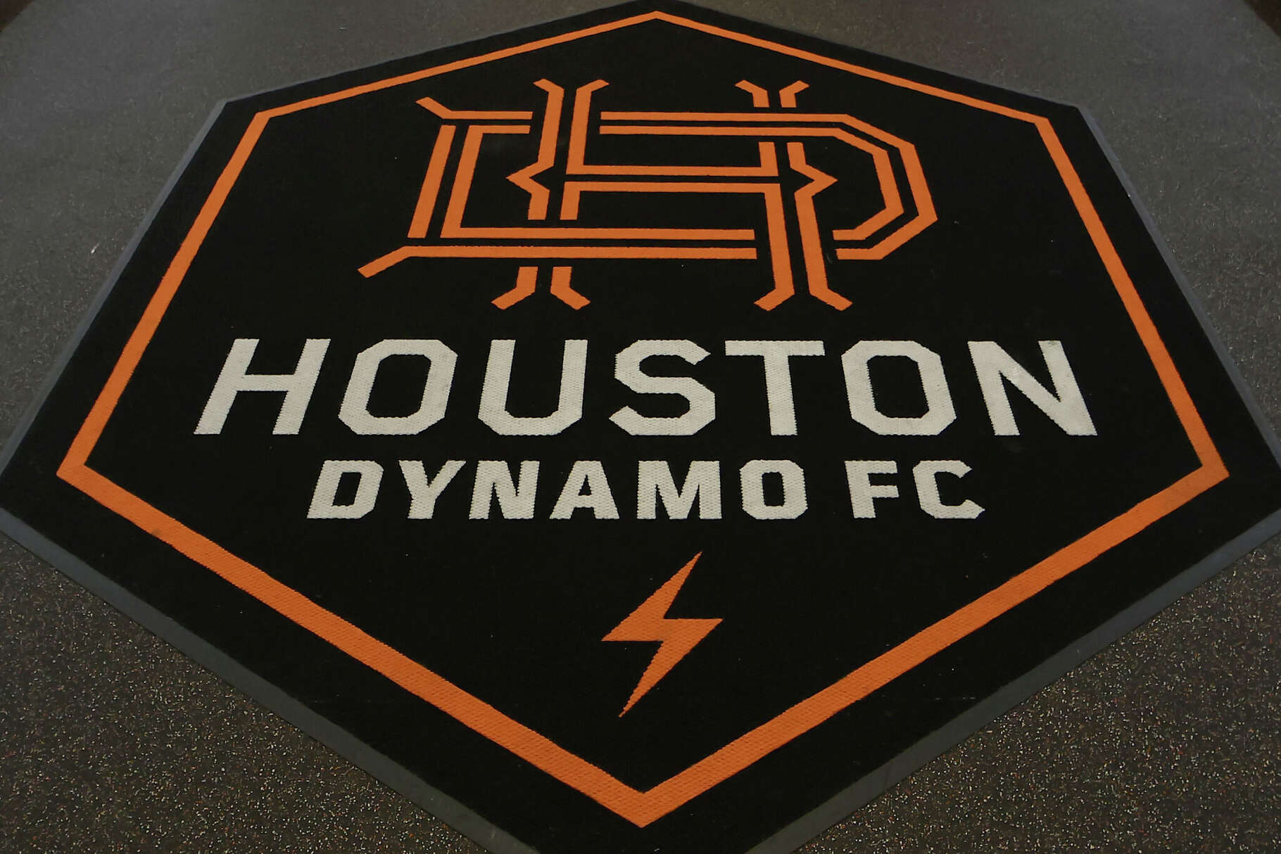 HOUSTON, TEXAS - FEBRUARY 28: A view of the Houston Dynamo FC logo before the game against the LAFC at Shell Energy Stadium on February 28, 2026 in Houston, Texas. (Photo by Tim Warner/Getty Images)