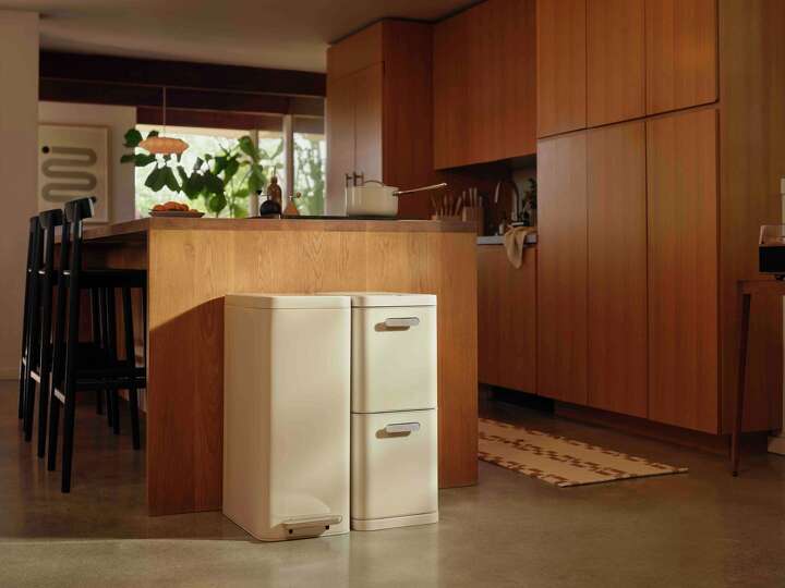 Caraway's new trash and recycling bins fix your ugly kitchen problem
