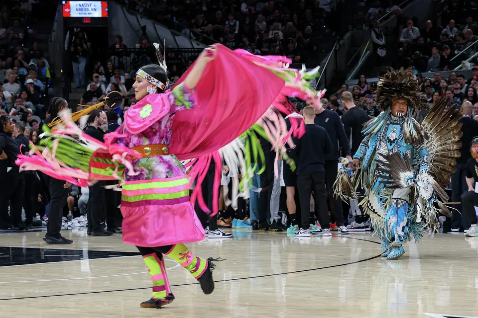 Members of the United San Antonio Pow Wow committee perform during Native American Heritage Night at Frost Bank Center in San Antonio on Monday, April 6, 2026.