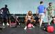 NFL hopeful Tyren Montgomery, center, takes a break between the rounds of his workout at Warrior Church Gym in Spring on Monday, April 6, 2026.