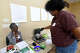Sylvia Johnson talks with Miriam Garcia as they and others prepare a healthy morning oatmeal during the Good Eats Cooking Class at Alice Keith Park community center. Photo made Thursday, April 2, 2026 Kim Brent/Beaumont Enterprise staff