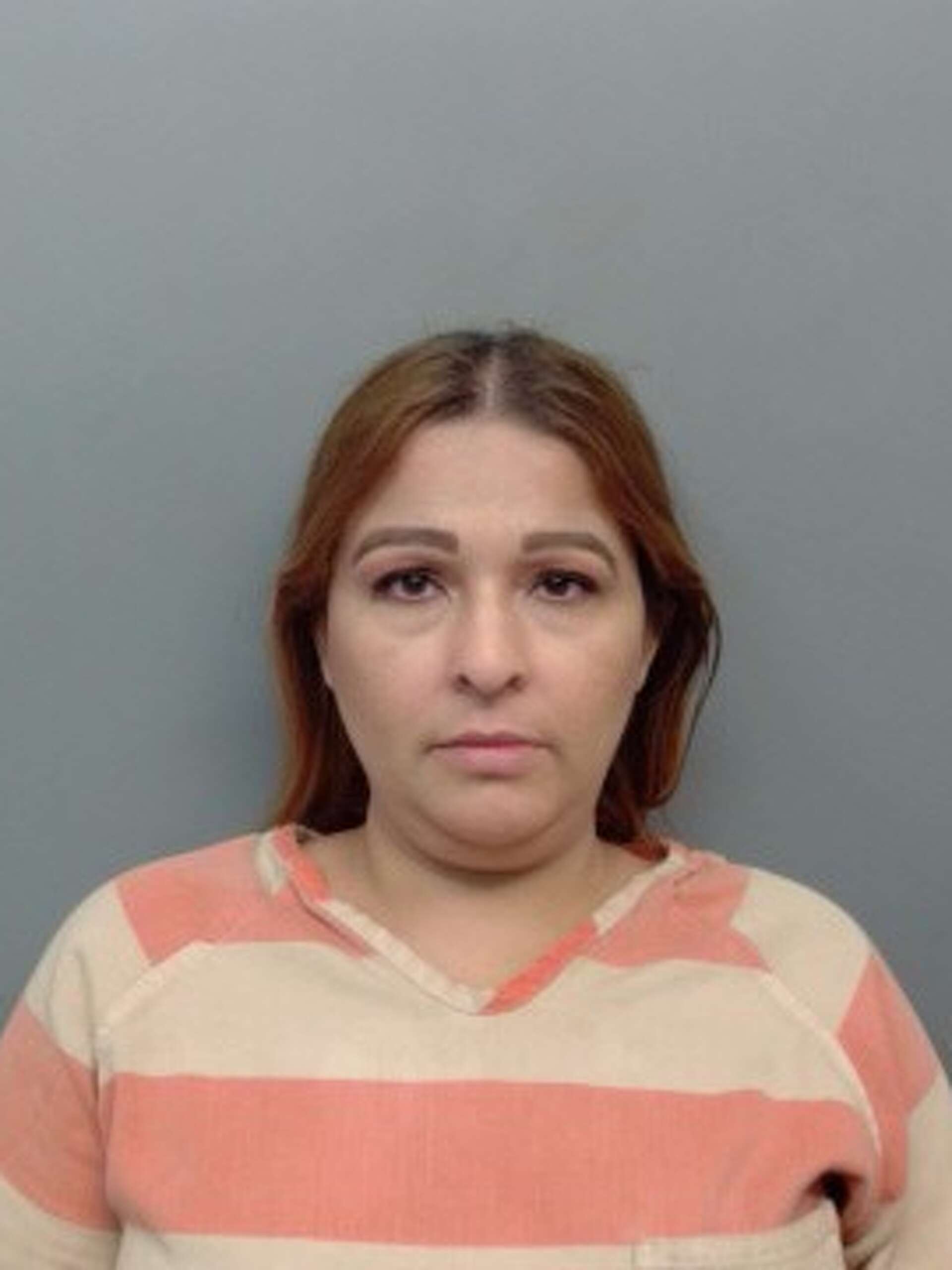 LPD: Woman arrested after leaving child in car while grocery shopping