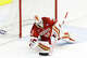 University of Denver goalie Matt Davis covers the puck during the NCAA Manchester Regional Final between the Boston College Eagles and the University of Denver Pioneers on March 30, 2025, at SNHU Arena in Manchester, New Hampshire.