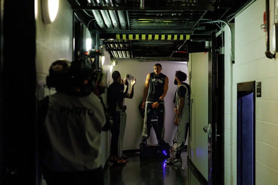 San Antonio Spurs forward Keldon Johnson (3) dances on a speaker as he hypes up teammates in the tunnel before warmups for an NBA game against the Portland Trail Blazers at Frost Bank Center, Wednesday, April 8, 2026, in San Antonio.