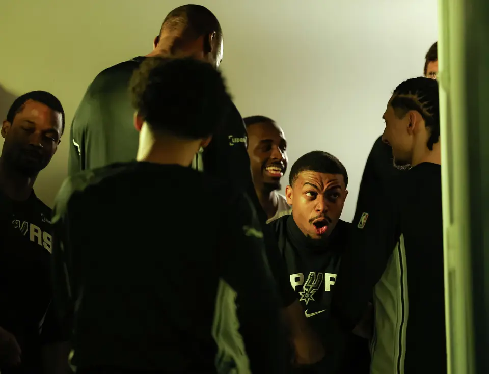 San Antonio Spurs forward Keldon Johnson (3) hypes up his teammates in the tunnel before warmups for an NBA game against the Portland Trail Blazers at Frost Bank Center, Wednesday, April 8, 2026, in San Antonio.