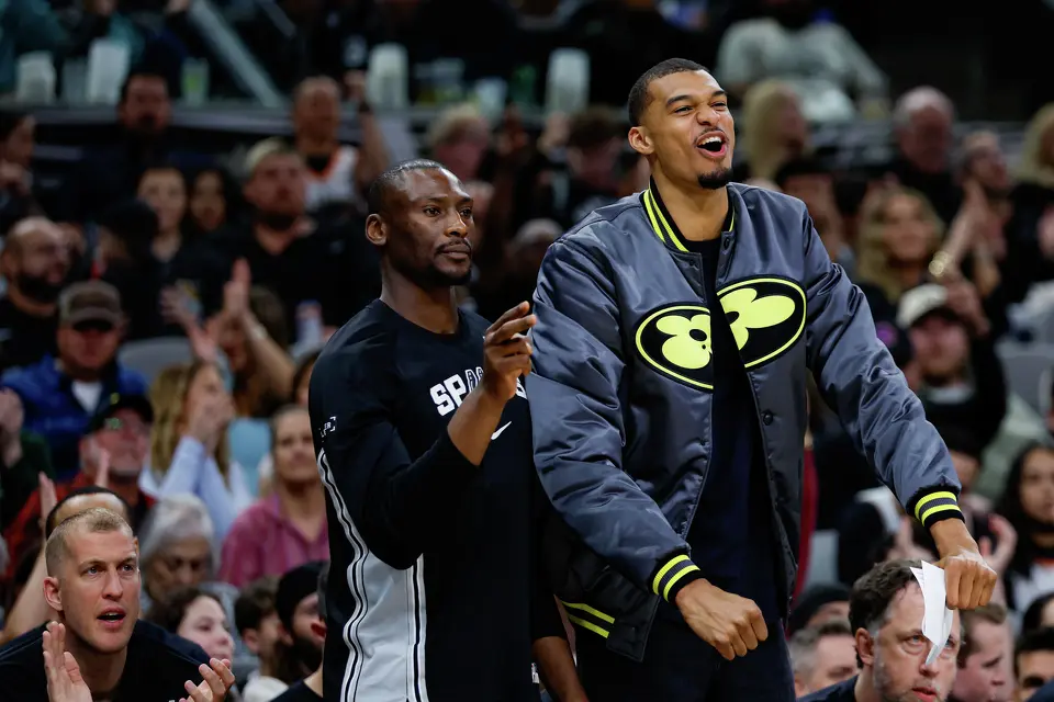 San Antonio Spurs forward Victor Wembanyama reacts to a jump shot made by San Antonio Spurs guard De'aaron Fox, not pictured, over the Portland Trail Blazers at Frost Bank Center in San Antonio, Wednesday, April 8, 2026.