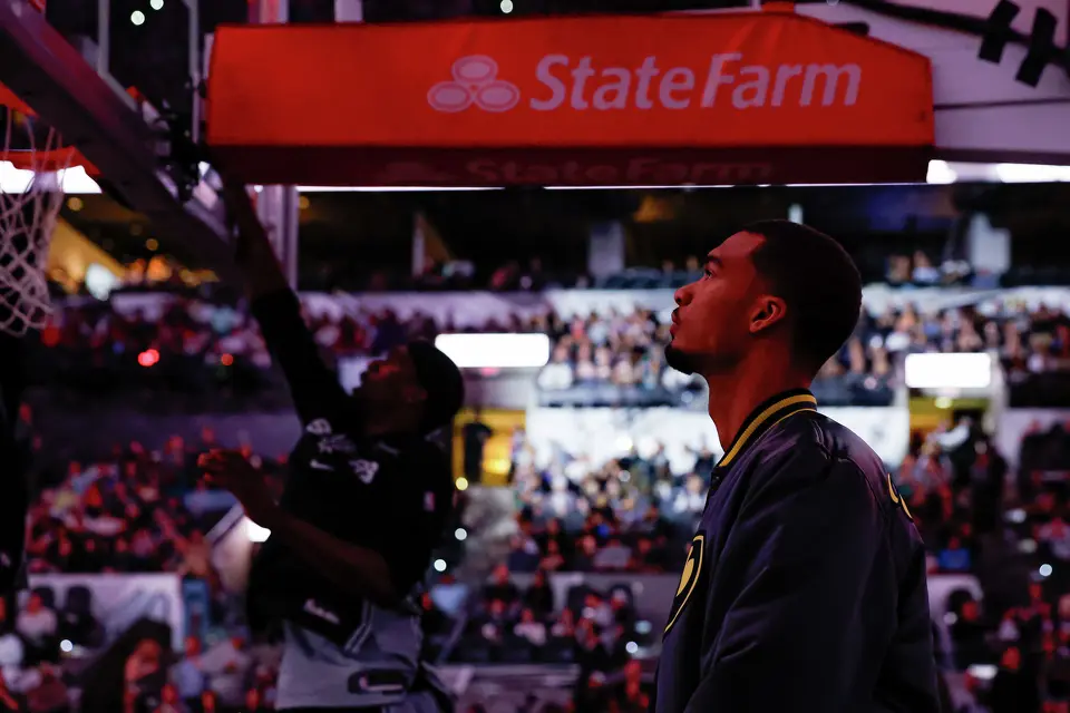 San Antonio Spurs forward Victor Wembanyama watches his teammates warm up for an NBA game against the Portland Trail Blazers at Frost Bank Center in San Antonio, Wednesday, April 8, 2026. Wembanyama did not play because of an injury sustained Monday night against the Philadelphia 76ers.