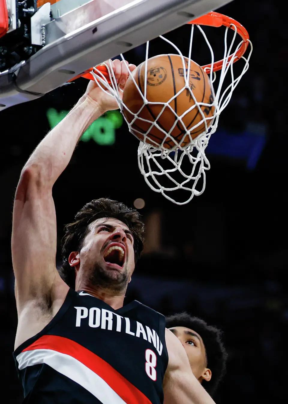 Portland Trail Blazers forward Deni Avdija (8) dunks on the San Antonio Spurs during an NBA game at Frost Bank Center in San Antonio, Wednesday, April 8, 2026. The Spurs defeated the Trail Blazers 112-101.