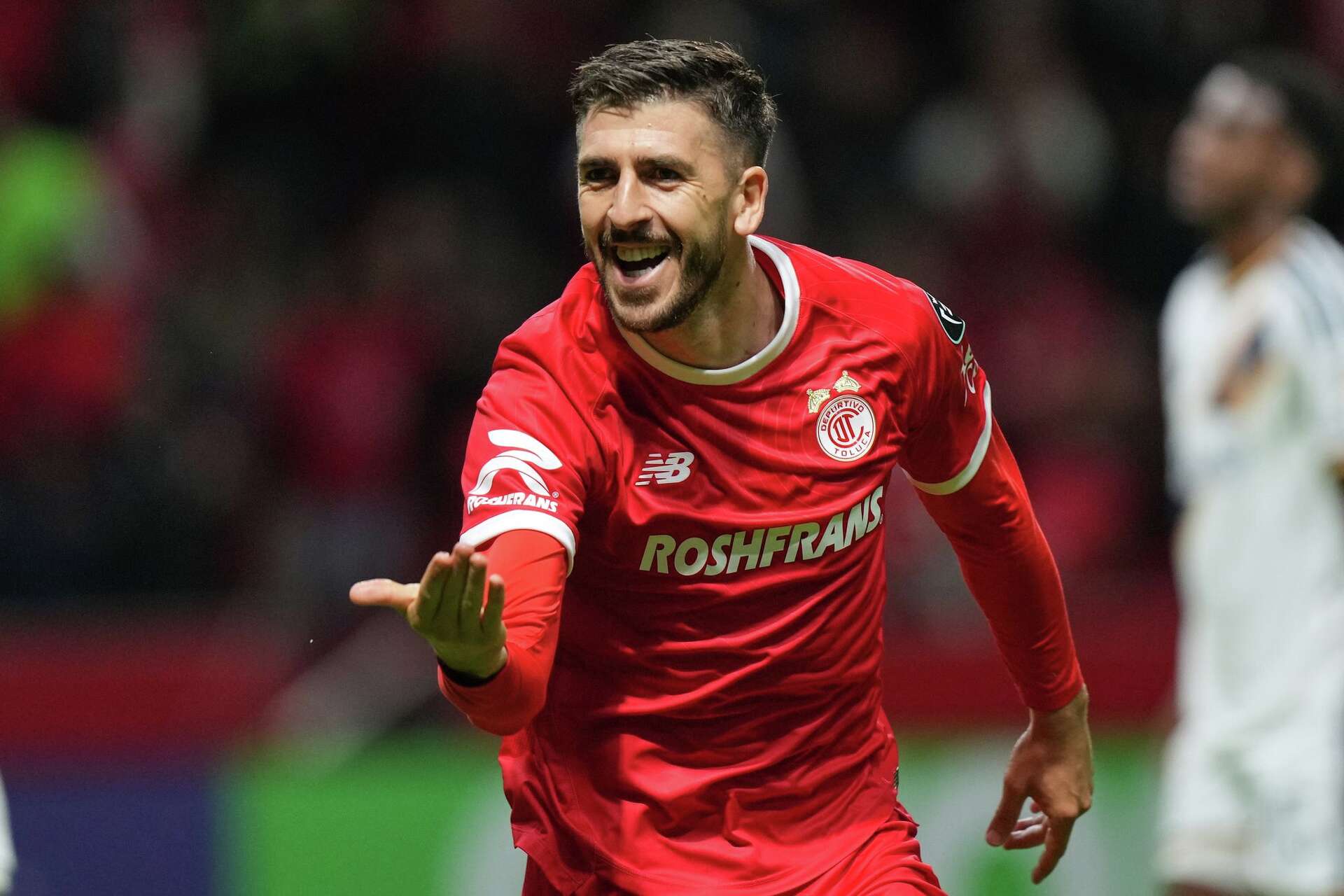 Paulinho's hat trick leads Toluca to a 4-2 first-leg win over LA