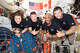The Artemis II crew, from left, Mission Specialist Christina Koch, Mission Specialist Jeremy Hansen, Pilot Victor Glover, and Commander Reid Wiseman, pause for a group photo inside the Orion spacecraft on their way home. Following a swing around the far side of the Moon on April 6, 2026, the crew exited the lunar sphere of influence (the point at which the Moon's gravity has a stronger pull on Orion than the Earth's) on April 7, and are headed back to Earth for a splashdown in the Pacific Ocean on April 10. (NASA/TNS)